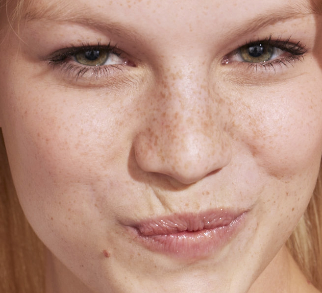 A closeup of a girl wearing a natural and fresh makeup, by Louise Wittlich