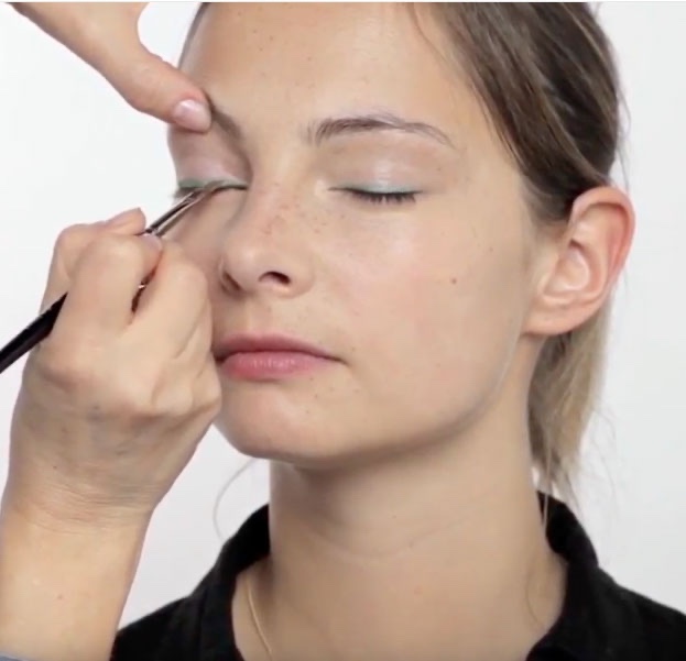 A young woman being made up in fresh spring colors, by makeup artist Louise Wittlich